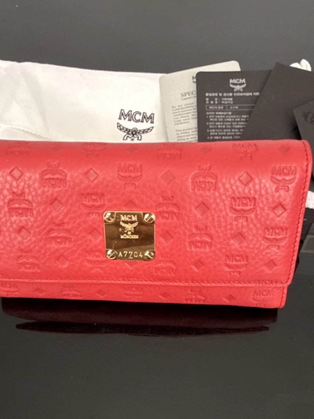 MCM Red Embossed Leather Continental Wallet with Gold Plaque